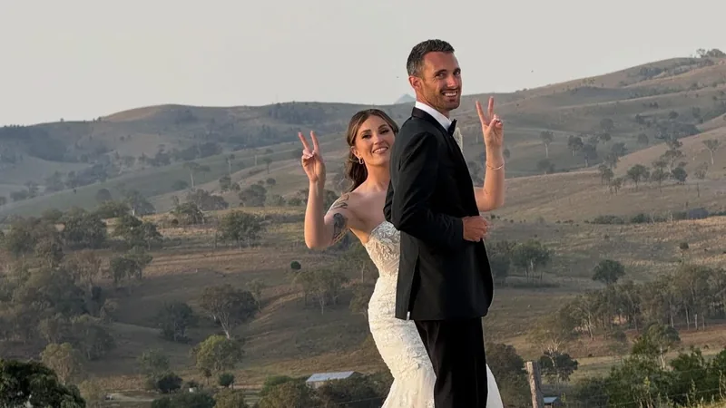 Chelsey and Kayden at sunset on the estate, rolling hills behind them